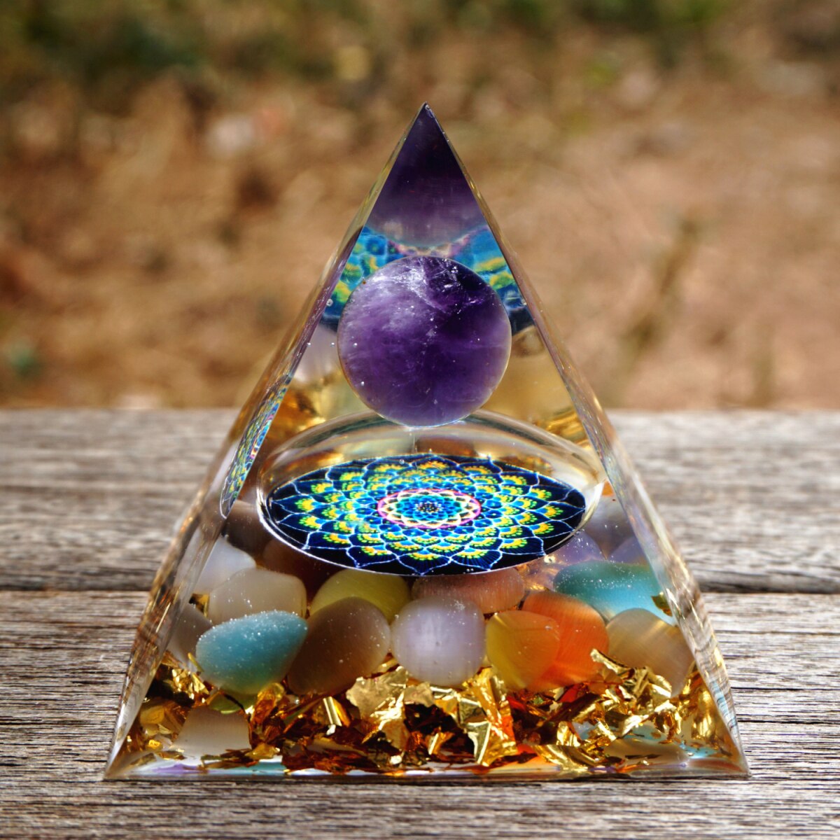 Cat's Eye and Amethyst Orgonite Pyramid with Amethyst sphere and colorful cat's eye obsidian crystals